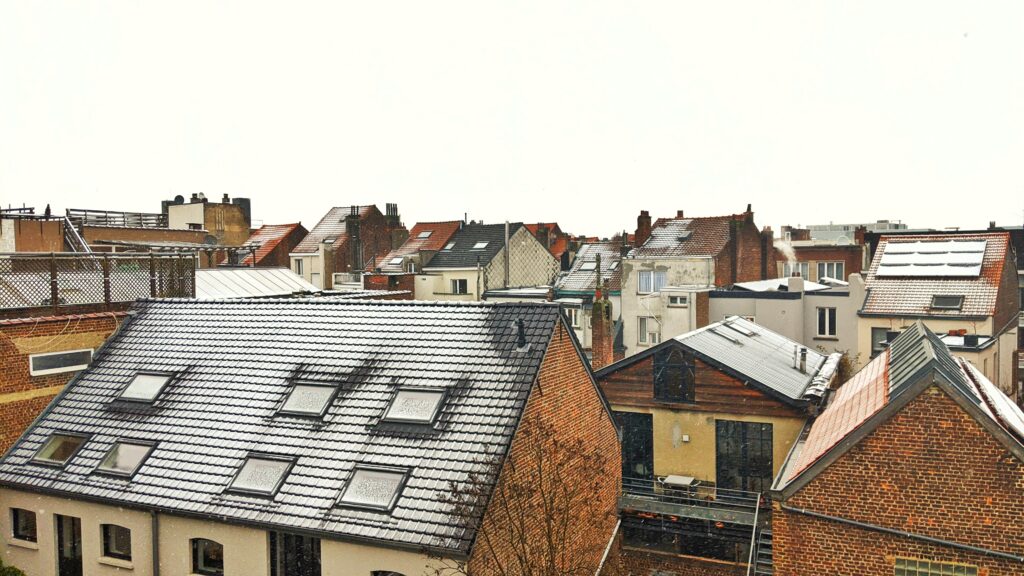 slightly snowy rooftops