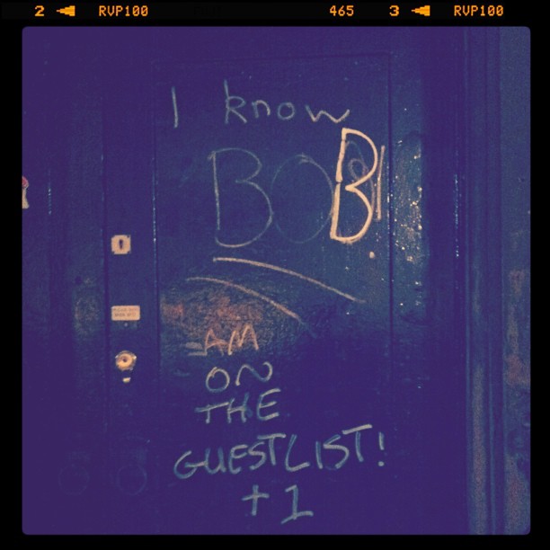 graffiti on the front door of a club